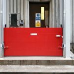 Drop-Down Flood Control Barrier